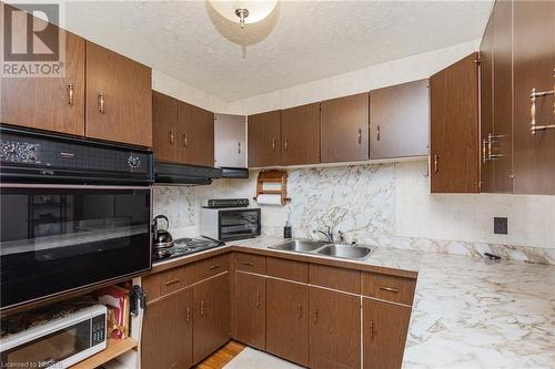 541 Brydges Street, Mattawa, ON - Indoor Photo Showing Kitchen With Double Sink