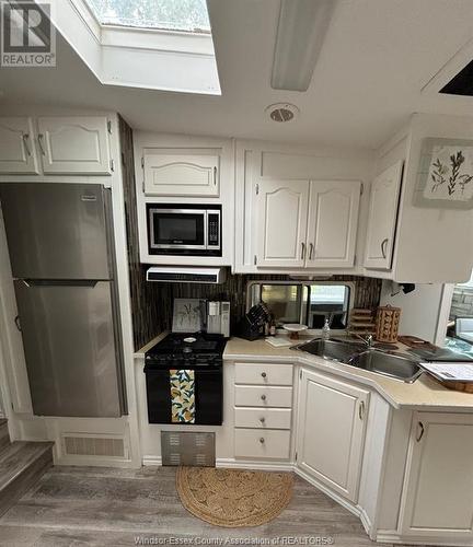 126 Mersea Rd 5 Unit# 36, Leamington, ON - Indoor Photo Showing Kitchen With Double Sink