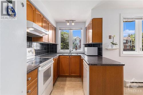 332 Briston Private, Ottawa, ON - Indoor Photo Showing Kitchen With Double Sink