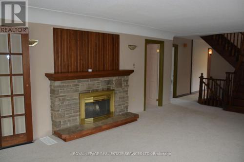 296 Barton Street, Hamilton (Stoney Creek), ON - Indoor Photo Showing Living Room With Fireplace