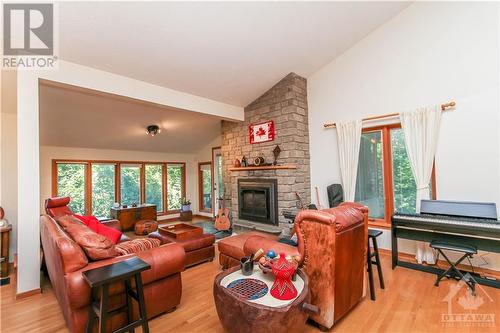 244 Tudor Place, Ottawa, ON - Indoor Photo Showing Living Room With Fireplace