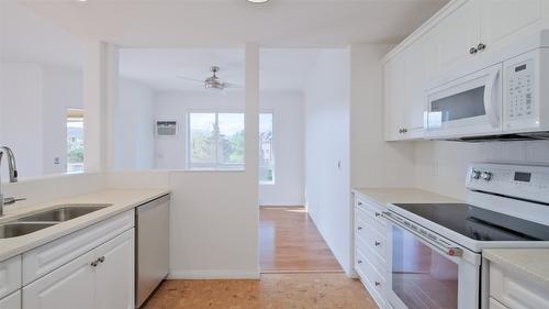 315-1962 Enterprise Way, Kelowna, BC - Indoor Photo Showing Kitchen With Double Sink