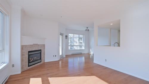 315-1962 Enterprise Way, Kelowna, BC - Indoor Photo Showing Living Room With Fireplace