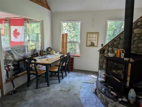 1574 Ireland Road, Seymour Arm, BC - Indoor Photo Showing Dining Room With Fireplace