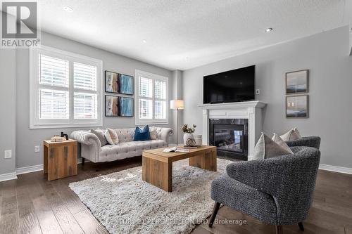 24 Bignell Crescent, Ajax (Northeast Ajax), ON - Indoor Photo Showing Living Room With Fireplace