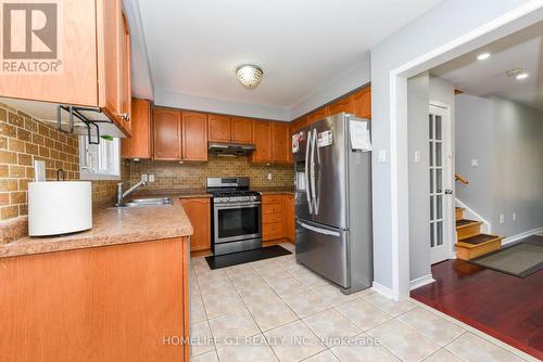 27 Salonica Road, Brampton (Fletcher'S Meadow), ON - Indoor Photo Showing Kitchen With Double Sink