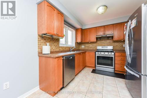 27 Salonica Road, Brampton (Fletcher'S Meadow), ON - Indoor Photo Showing Kitchen With Double Sink