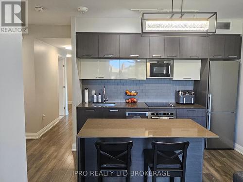 211 - 4800 Highway 7 Street, Vaughan, ON - Indoor Photo Showing Kitchen With Stainless Steel Kitchen With Upgraded Kitchen