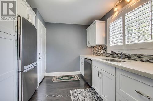 26 Miller Park Avenue, Bradford West Gwillimbury, ON - Indoor Photo Showing Kitchen With Double Sink