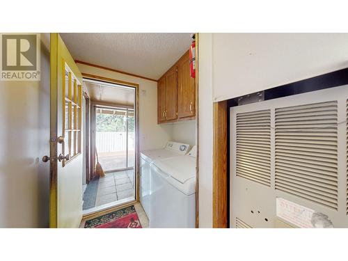 1975/1967 Jim Smith Lake  Road, Cranbrook, BC - Indoor Photo Showing Laundry Room