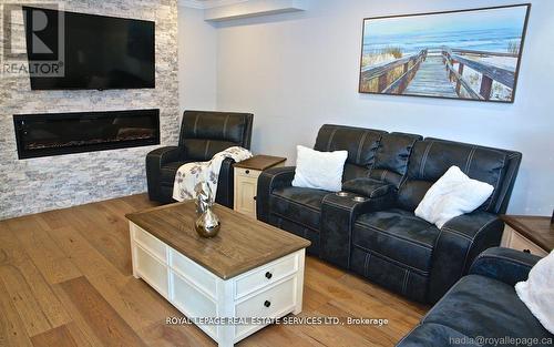 Upper - 2116 Eighth Line, Oakville, ON - Indoor Photo Showing Living Room With Fireplace