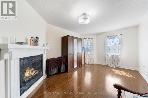 32 Pressed Brick Drive, Brampton (Brampton North), ON - Indoor Photo Showing Living Room With Fireplace