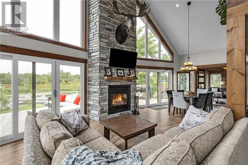 6857 Silmser Road, Cornwall, ON - Indoor Photo Showing Living Room With Fireplace