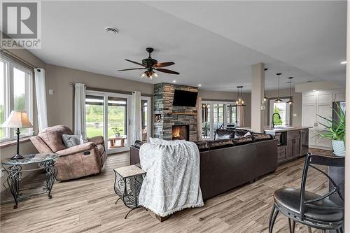 6857 Silmser Road, Cornwall, ON - Indoor Photo Showing Living Room With Fireplace