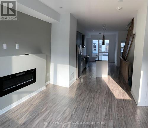 1658 Pleasure Valley Path N, Oshawa (Samac), ON - Indoor Photo Showing Living Room With Fireplace