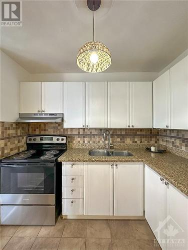 2020 Jasmine Crescent Unit#302, Ottawa, ON - Indoor Photo Showing Kitchen With Double Sink