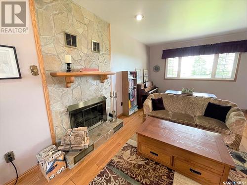 Ryan Acreage, Hudson Bay Rm No. 394, SK - Indoor Photo Showing Living Room With Fireplace