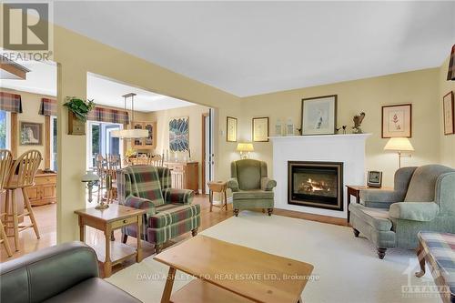 4537 Kingfish Bay Road N, Rideau Lakes, ON - Indoor Photo Showing Living Room With Fireplace