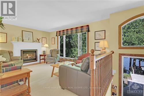 4537 Kingfish Bay Road N, Rideau Lakes, ON - Indoor Photo Showing Living Room With Fireplace