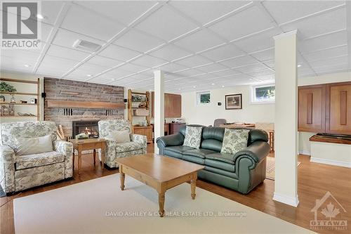 4537 Kingfish Bay Road N, Rideau Lakes, ON - Indoor Photo Showing Living Room With Fireplace