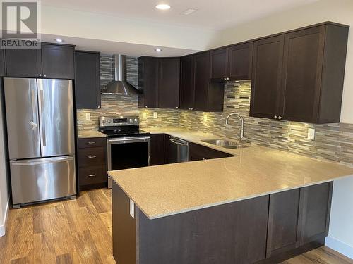 302 467 Tabor Boulevard, Prince George, BC - Indoor Photo Showing Kitchen With Double Sink With Upgraded Kitchen