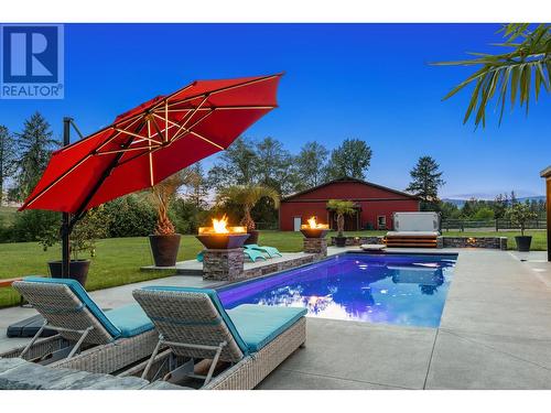 4284 Jaud Road, Kelowna, BC - Outdoor With In Ground Pool With Backyard