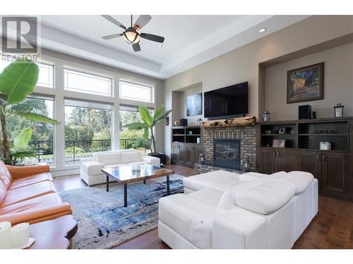 4284 Jaud Road, Kelowna, BC - Indoor Photo Showing Living Room With Fireplace