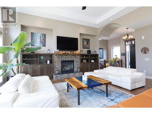 4284 Jaud Road, Kelowna, BC - Indoor Photo Showing Living Room With Fireplace