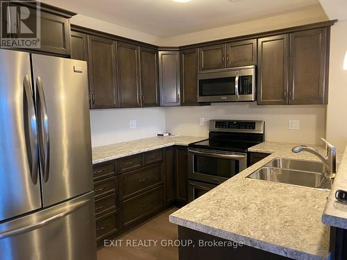 81 Mountain Ash Drive, Belleville, ON - Indoor Photo Showing Kitchen With Double Sink