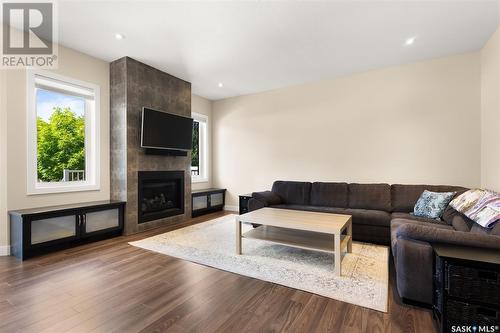 3414 Green Stone Road, Regina, SK - Indoor Photo Showing Living Room With Fireplace