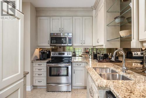 311 - 20 Burkebrook Place, Toronto (Bridle Path-Sunnybrook-York Mills), ON - Indoor Photo Showing Kitchen With Double Sink