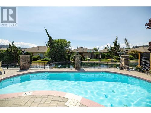 595 Yates Road Unit# 302, Kelowna, BC - Outdoor With In Ground Pool With Backyard