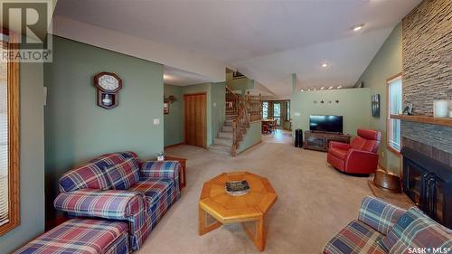 3318 Tanager Crescent E, Regina, SK - Indoor Photo Showing Living Room With Fireplace