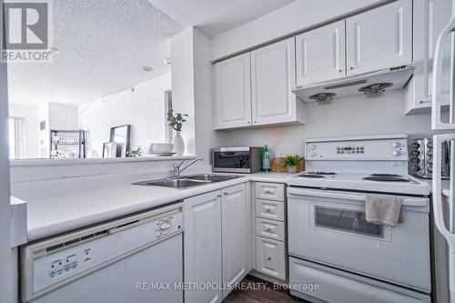 Ph109 - 11 Lee Centre Drive, Toronto (Woburn), ON - Indoor Photo Showing Kitchen With Double Sink