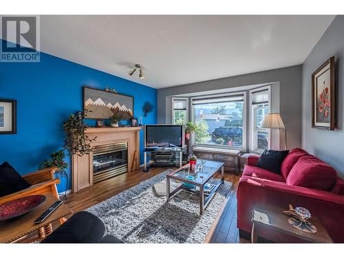 335 Falcon Drive, Penticton, BC - Indoor Photo Showing Living Room With Fireplace