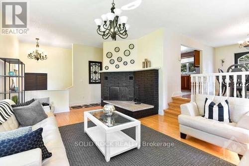 2597 North Campbell Road, Augusta (809 - Augusta Twp), ON - Indoor Photo Showing Living Room With Fireplace