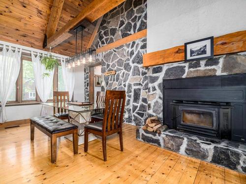 Dining room - 15 Ch. Des Bouleaux, Stoneham-Et-Tewkesbury, QC - Indoor Photo Showing Living Room With Fireplace