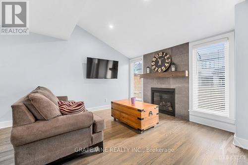 210 Purchase Crescent, Ottawa, ON - Indoor Photo Showing Living Room With Fireplace