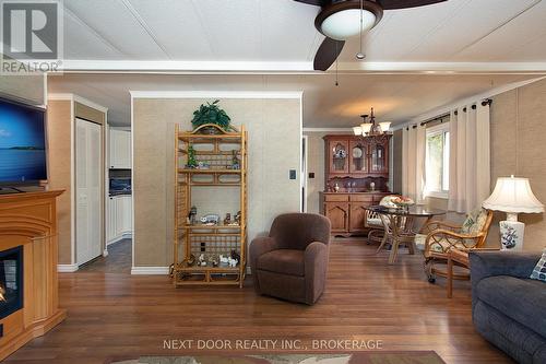 199 Pebble Beach Parkway, South Huron (Stephen Twp), ON - Indoor Photo Showing Living Room With Fireplace