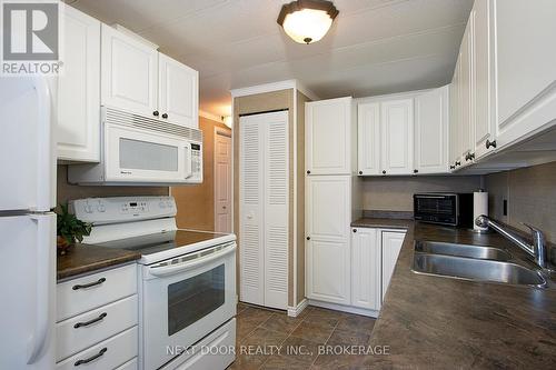 199 Pebble Beach Parkway, South Huron (Stephen Twp), ON - Indoor Photo Showing Kitchen With Double Sink