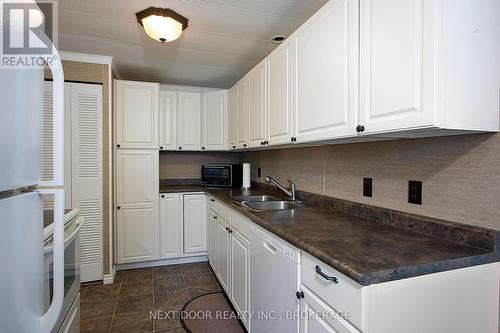 199 Pebble Beach Parkway, South Huron (Stephen Twp), ON - Indoor Photo Showing Kitchen With Double Sink