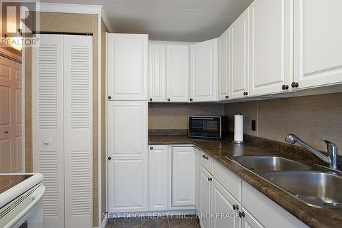 199 Pebble Beach Parkway, South Huron (Stephen Twp), ON - Indoor Photo Showing Kitchen With Double Sink