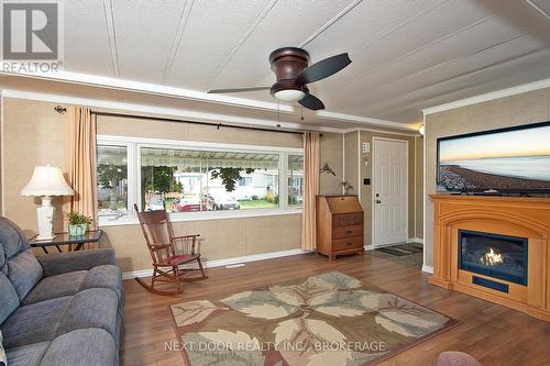 199 Pebble Beach Parkway, South Huron (Stephen Twp), ON - Indoor Photo Showing Living Room With Fireplace