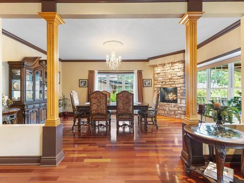 Dining room - 1065 Boul. Du Bord-De-L'Eau, Salaberry-De-Valleyfield, QC - Indoor Photo Showing Dining Room With Fireplace