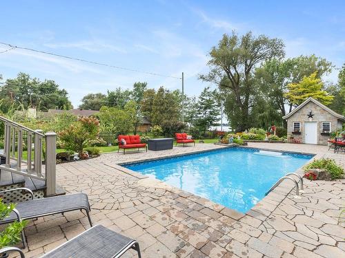 Piscine - 1065 Boul. Du Bord-De-L'Eau, Salaberry-De-Valleyfield, QC - Outdoor With In Ground Pool With Deck Patio Veranda With Backyard