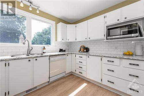 108 Banning Road, Kanata, ON - Indoor Photo Showing Kitchen With Double Sink