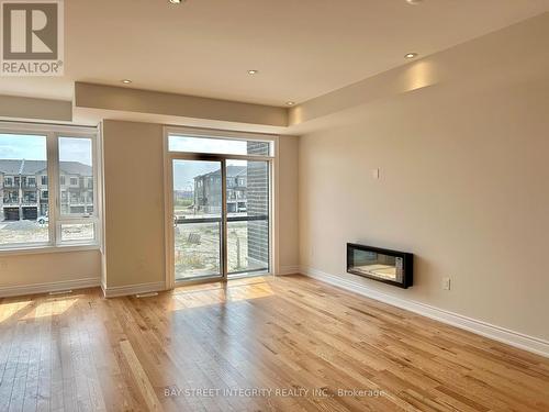 259 Tennant Circle, Vaughan, ON - Indoor Photo Showing Living Room With Fireplace