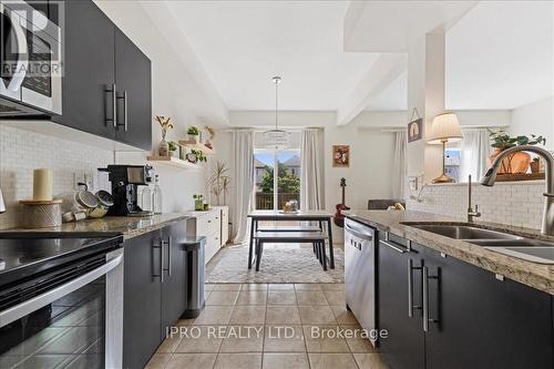 12 - 40 Dartmouth Gate, Hamilton (Lakeshore), ON - Indoor Photo Showing Kitchen With Double Sink With Upgraded Kitchen