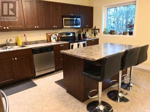 36-18 Azure Road, Whitehorse, YT - Indoor Photo Showing Kitchen With Double Sink