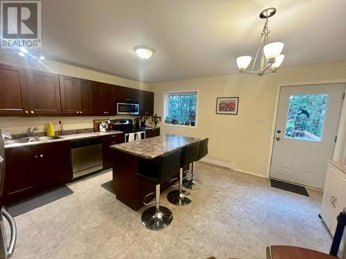 36-18 Azure Road, Whitehorse, YT - Indoor Photo Showing Kitchen With Double Sink